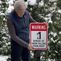 Beware of snow falling from the roof warning sign